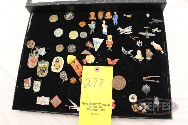 Display case of Asst. WWII Era pins,_1.jpg